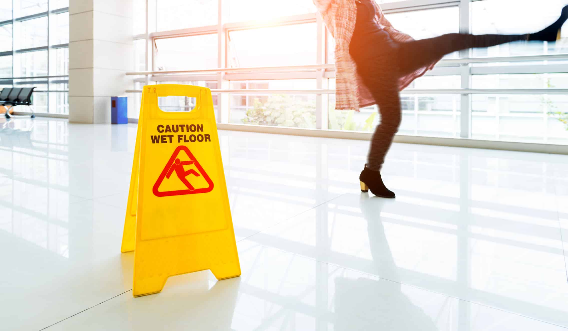 person slipping on floor due to lack of Prevention Of Slips Trips and Falls
