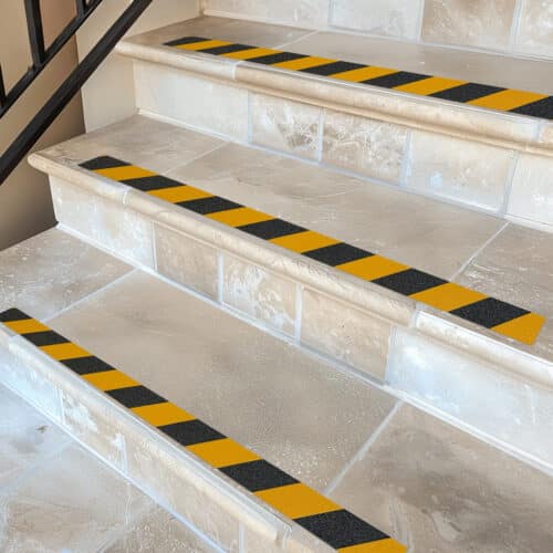 Black and Yellow Anti-Slip Tape on Slippery Stairs installed by Slip No More